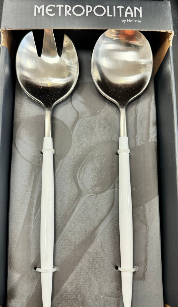 White and silver salad servers