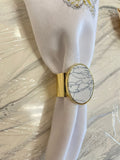 Gold stainless steel napkin ring with white marble piece